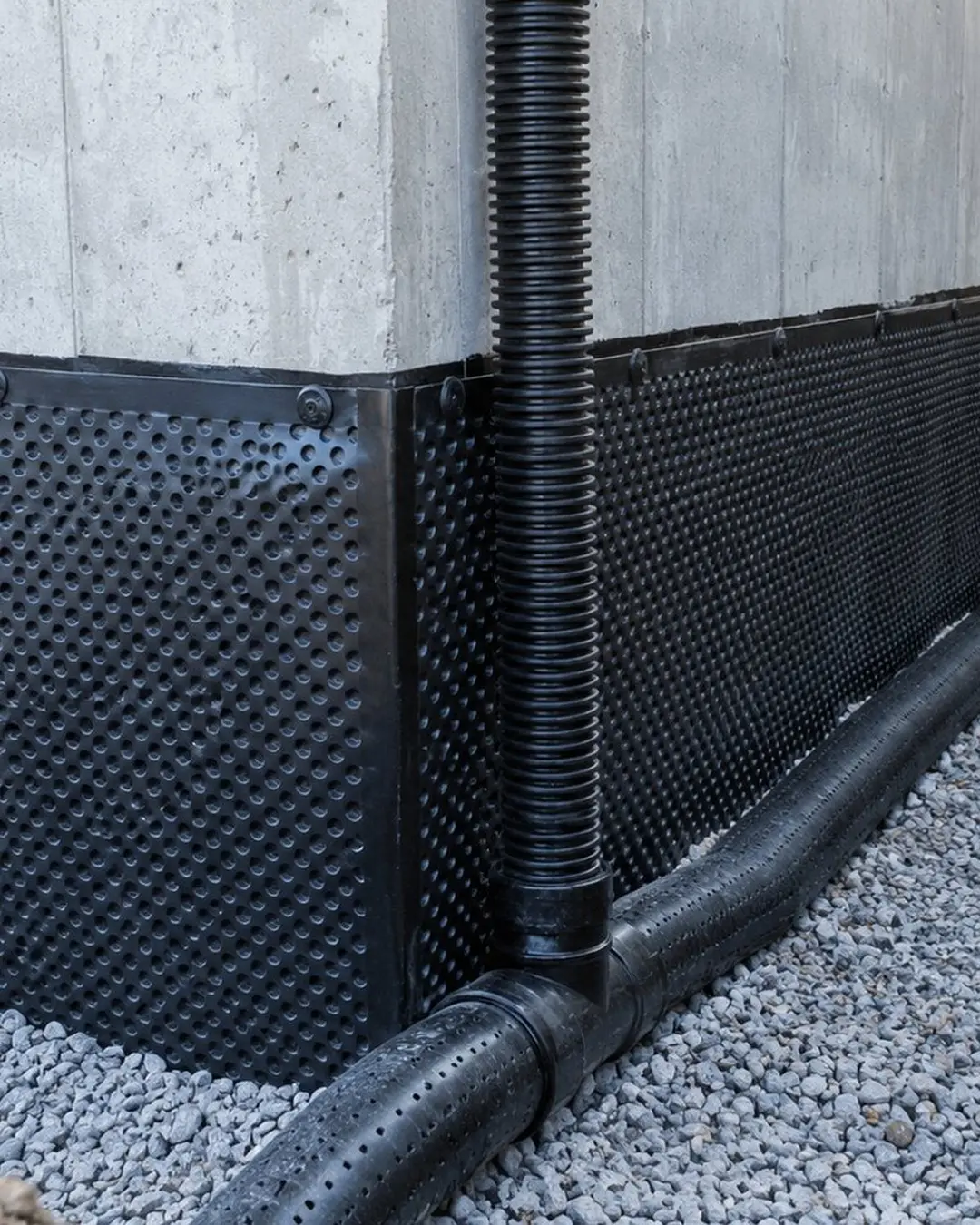 Foundation drainage work beside a residential basement wall